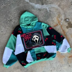 Oversized patchwork couple hoodie blending vintage horror motifs and sustainable fabrics, perfect gothic streetwear for matching fall outfits..